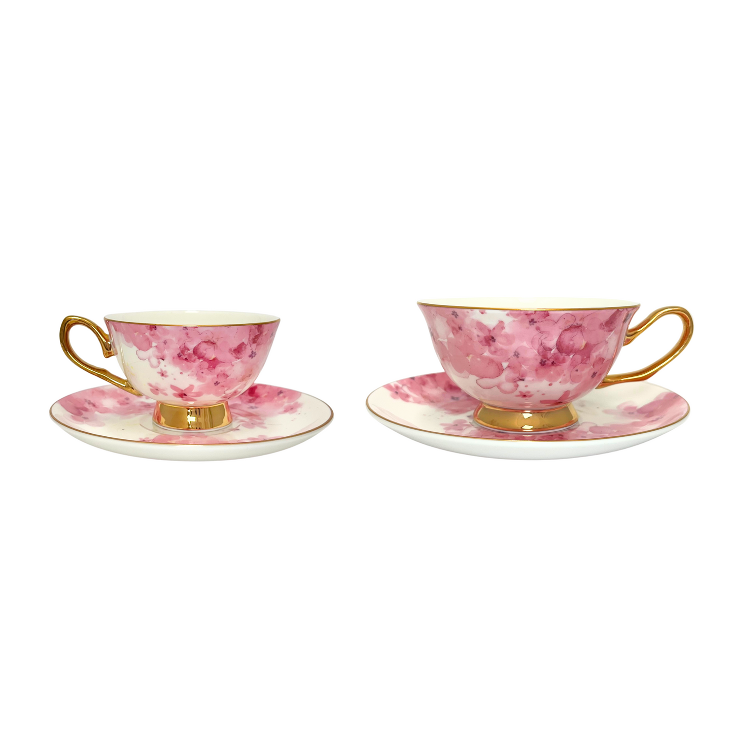 Two teacups with pink flowers on a white background with gold handle and edges. Mini teacup next to the standard sized teacup to show size difference. Sitting on matching pink flower saucer. Isolated on a white background.