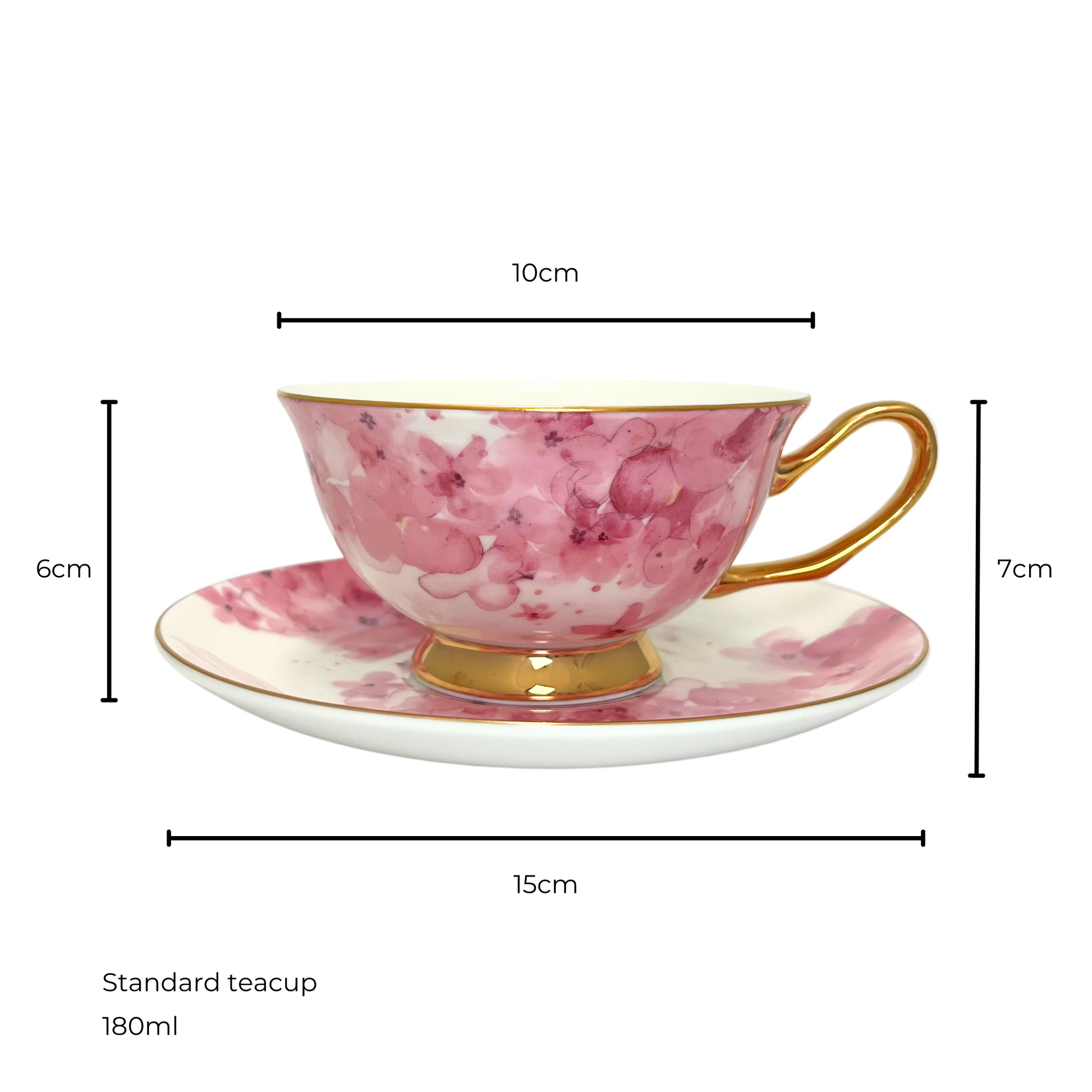 White and pink flower teacup with gold handle and edges sitting on matching white and pink flower saucer.  Isolated on a white background. Measurements shown of 10cm teacup diameter and 6cm height, saucer diameter 15cm and 7cm height of saucer and teacup